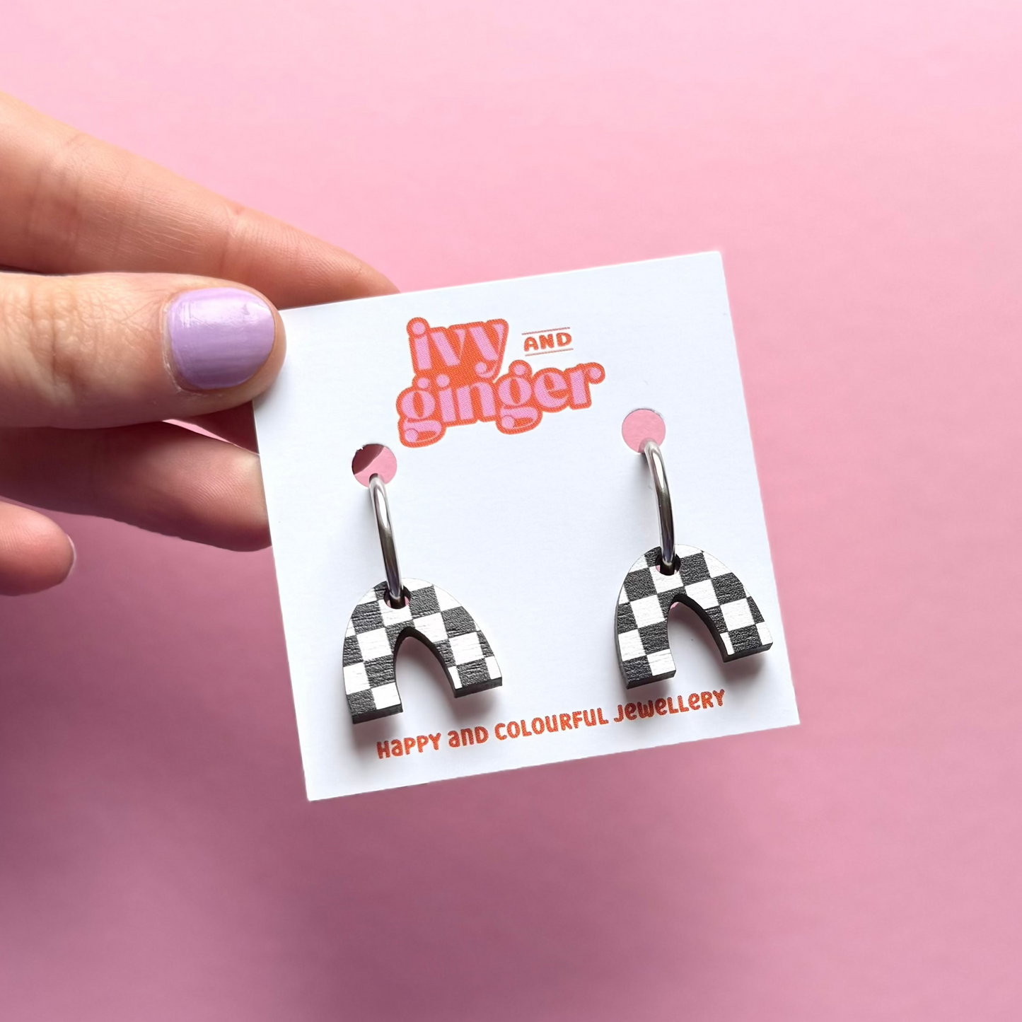 Black and white checkerboard arch hoop earrings