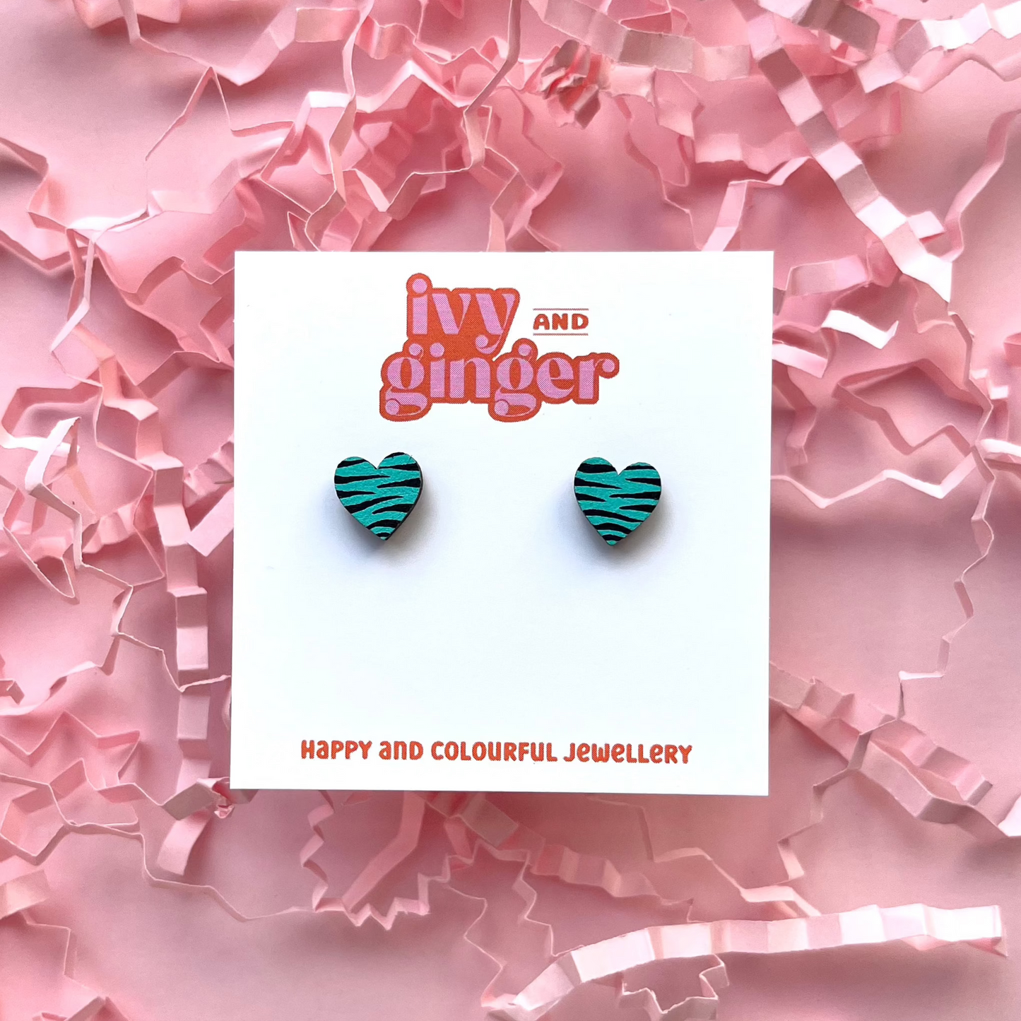 Mini teal and black zebra print heart stud earrings