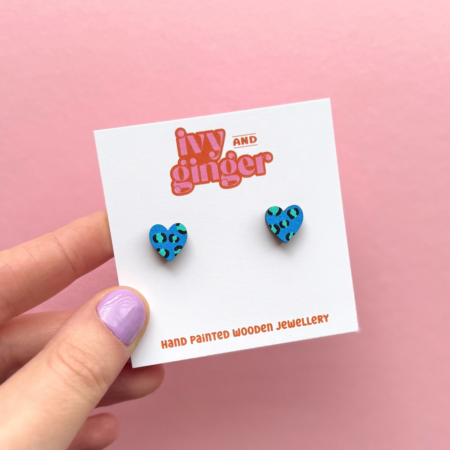 Blue and teal leopard print heart stud earrings