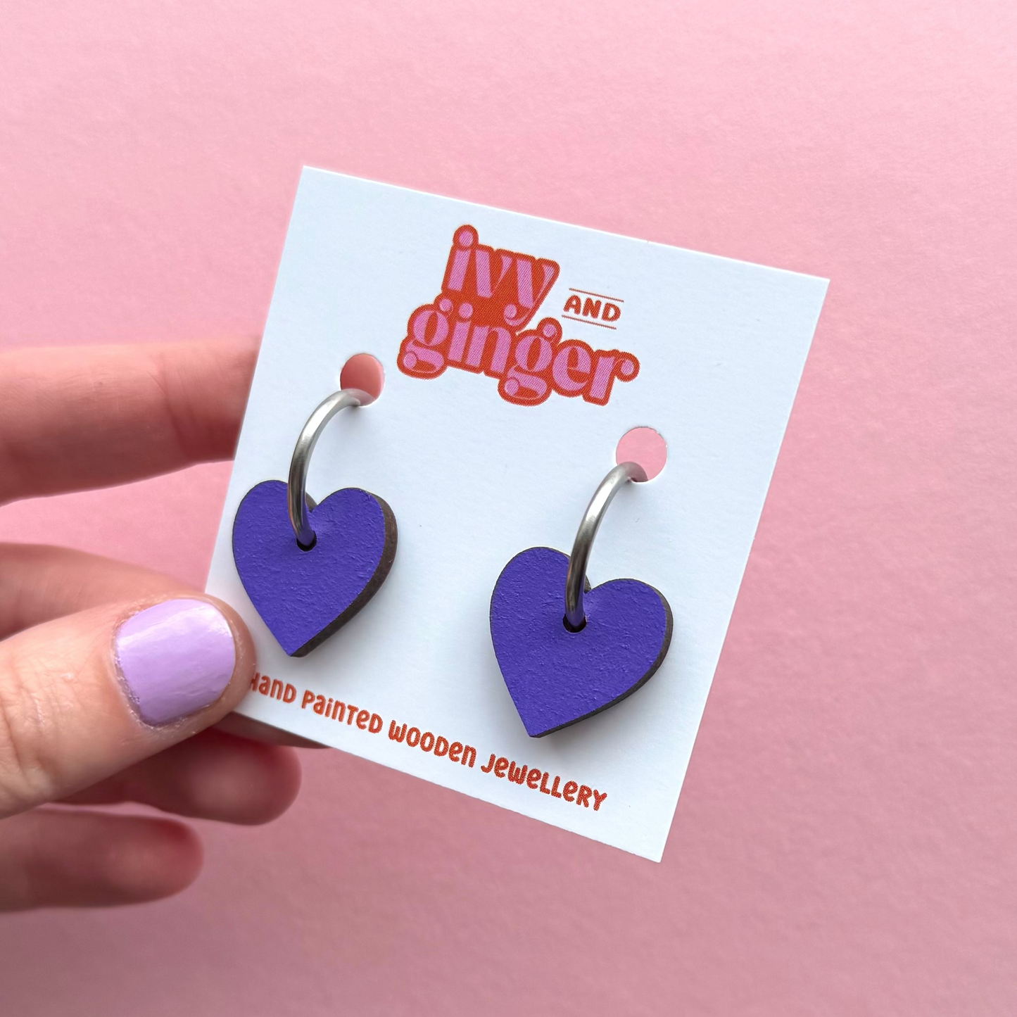Purple heart shaped hoop earrings