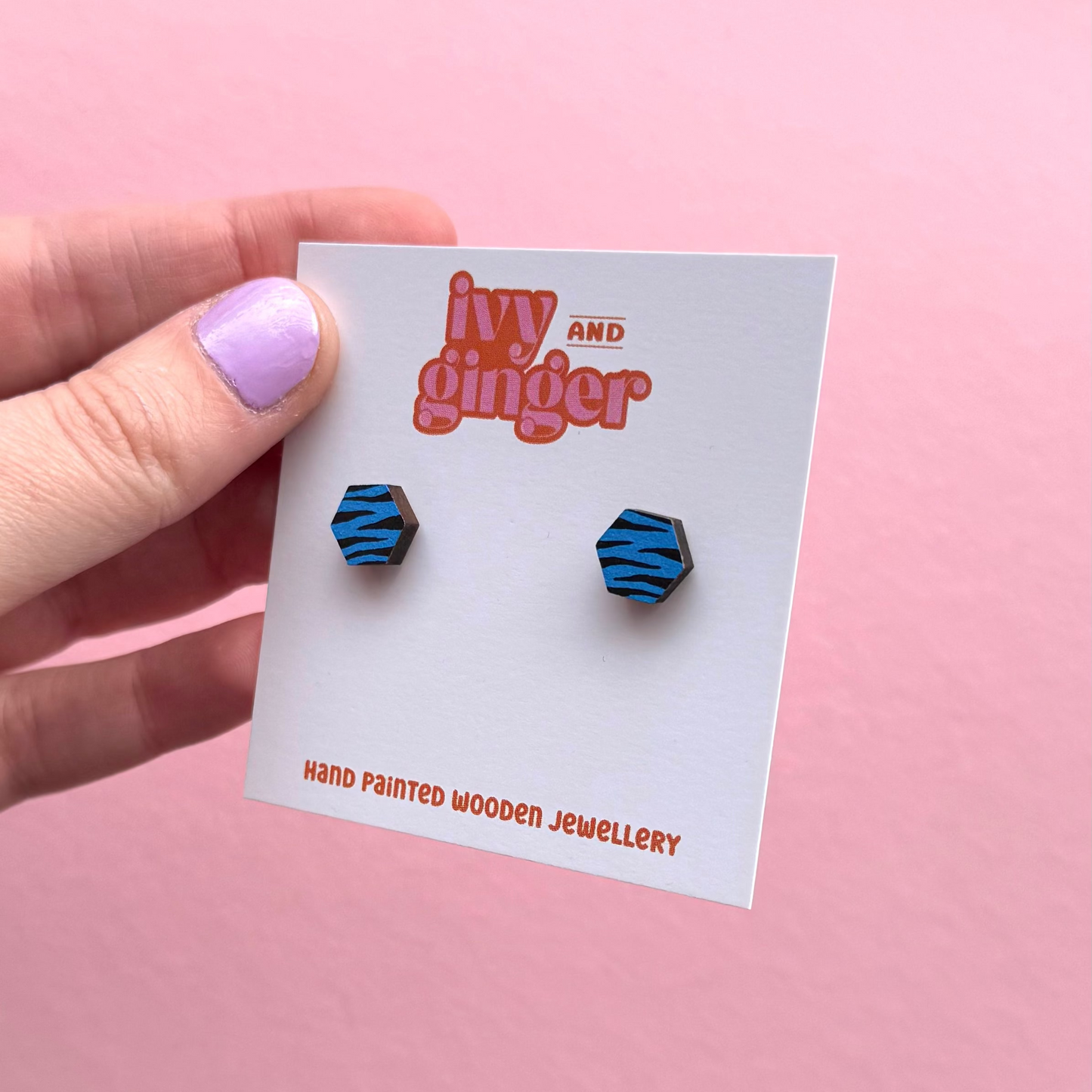 Mini blue and black zebra print hexagon stud earrings