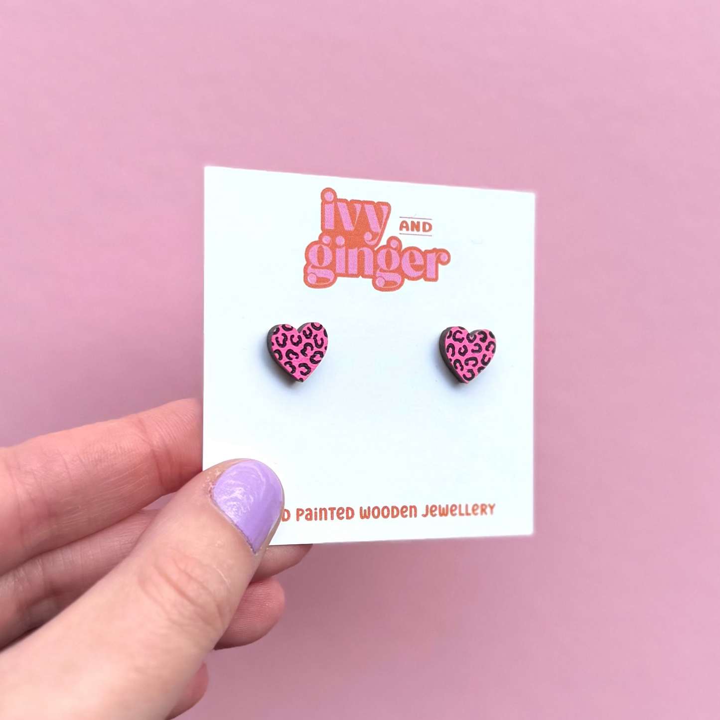 Mini bright pink and black leopard print heart studs