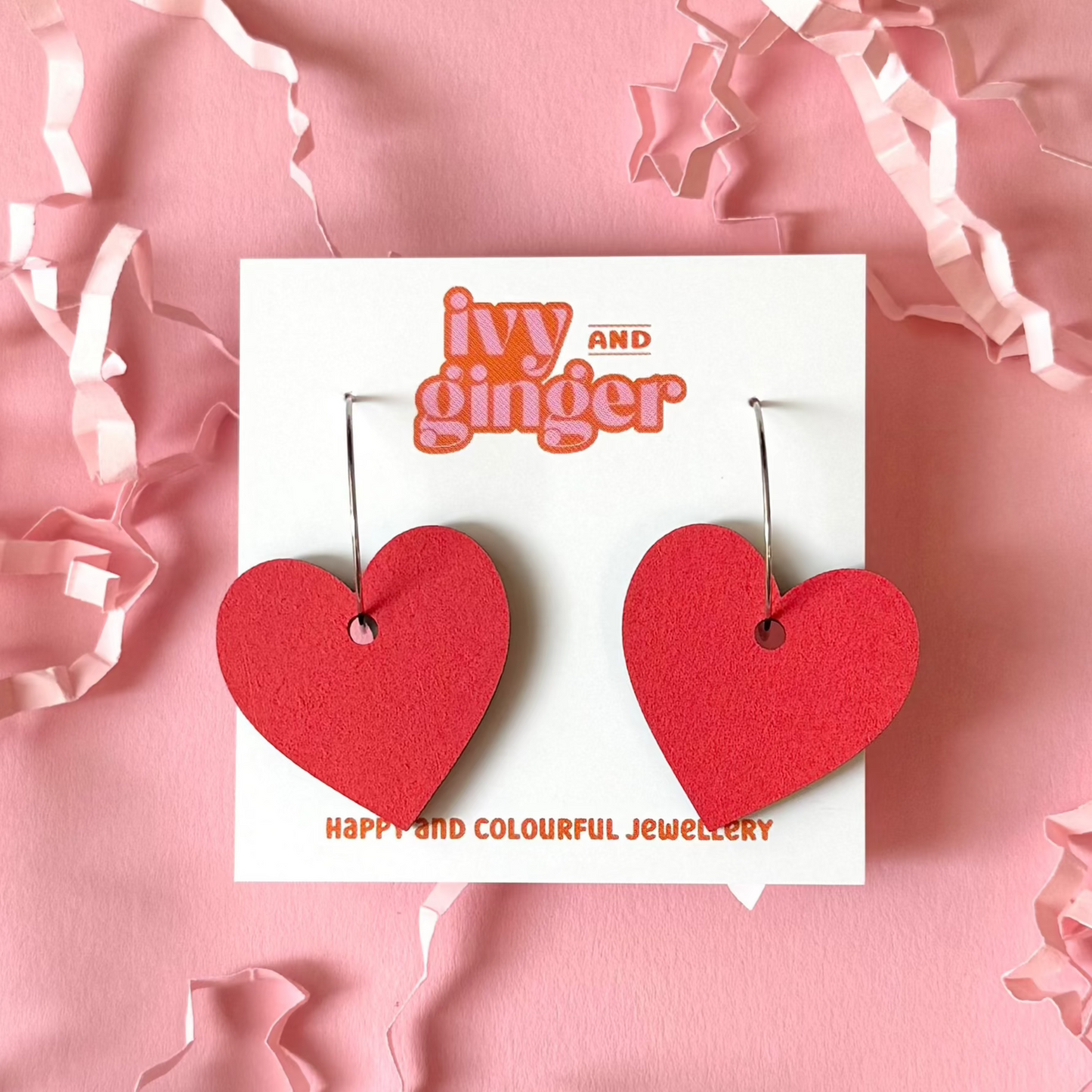Large red statement heart hoop earrings