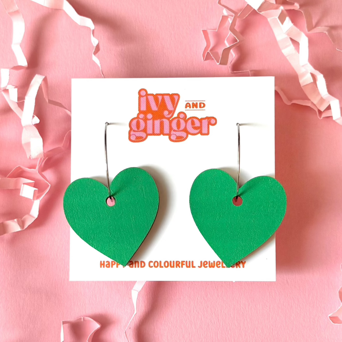 Large green statement heart hoop earrings