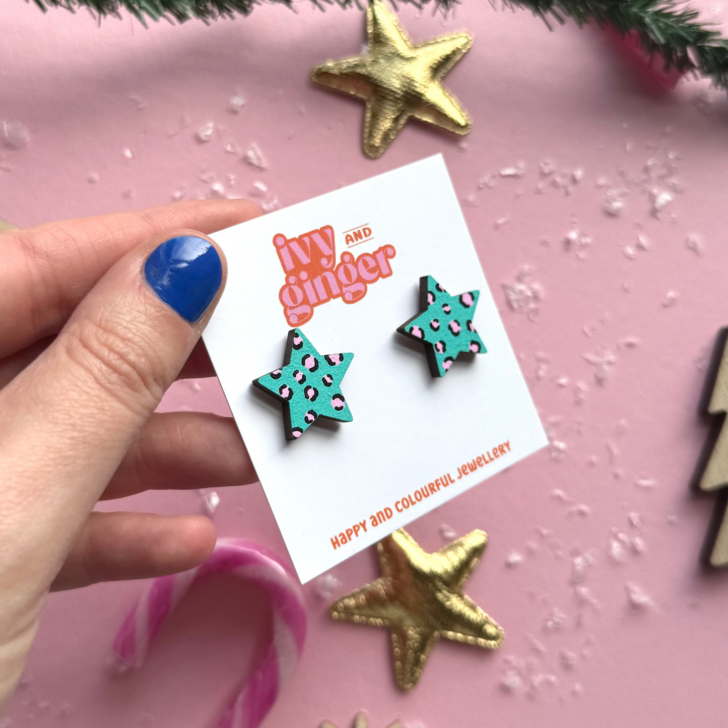 Teal and pink leopard print star stud earrings