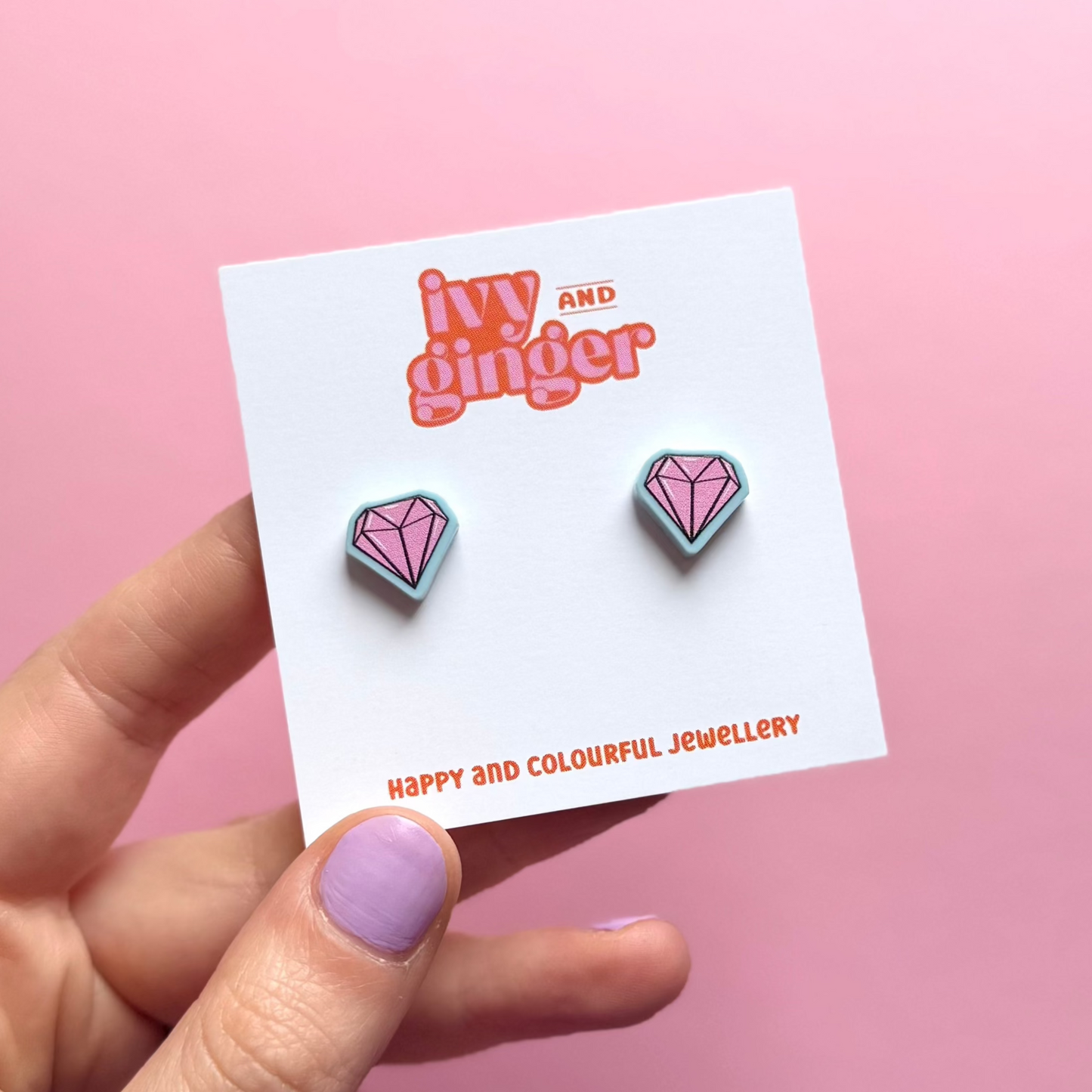 Pink diamond blue stud earrings