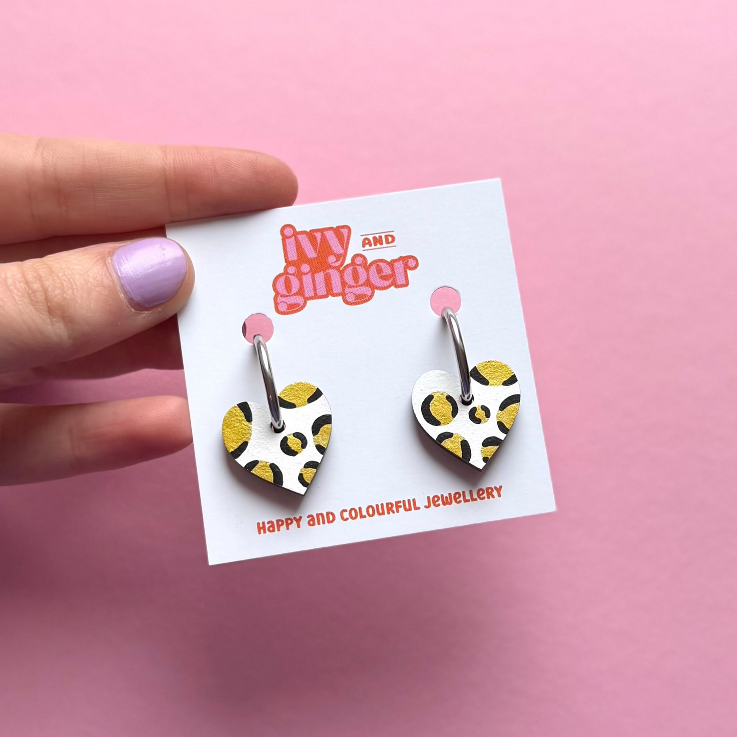 White and gold small heart hoop earrings