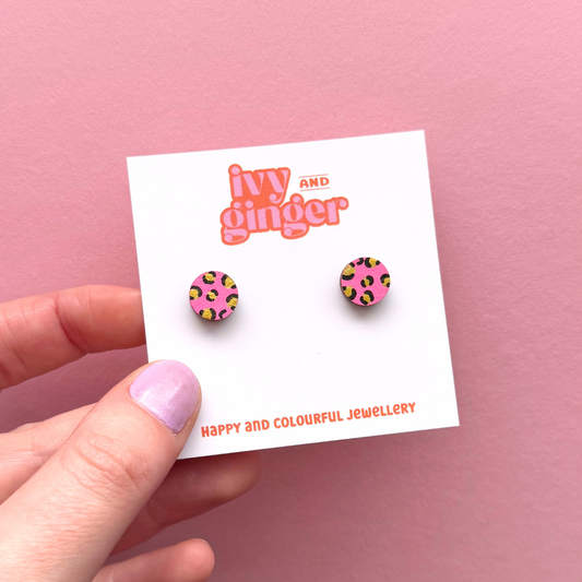 Mini leopard print circle studs in bright pink and gold