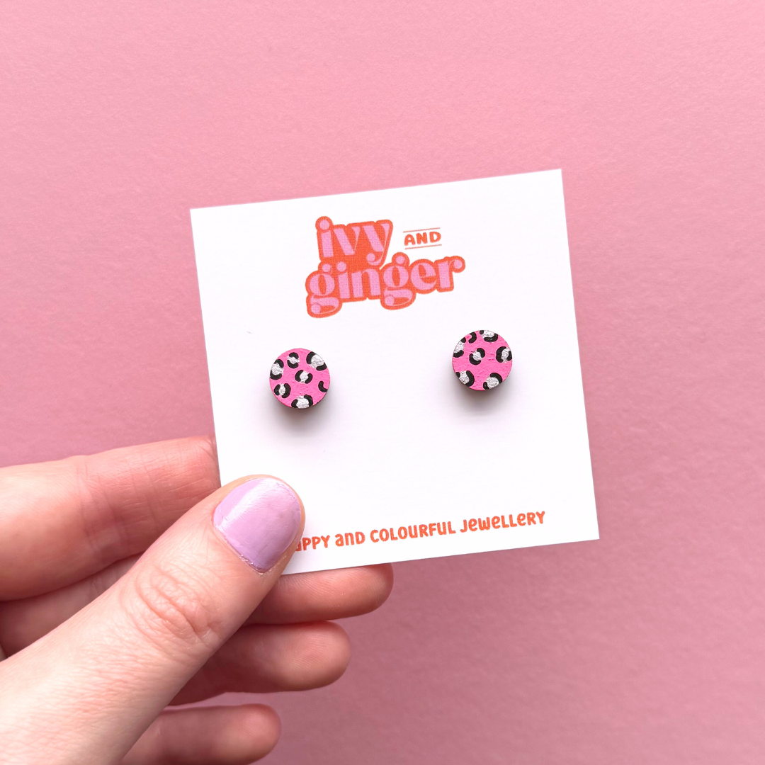Mini leopard print circle studs in bright pink and silver