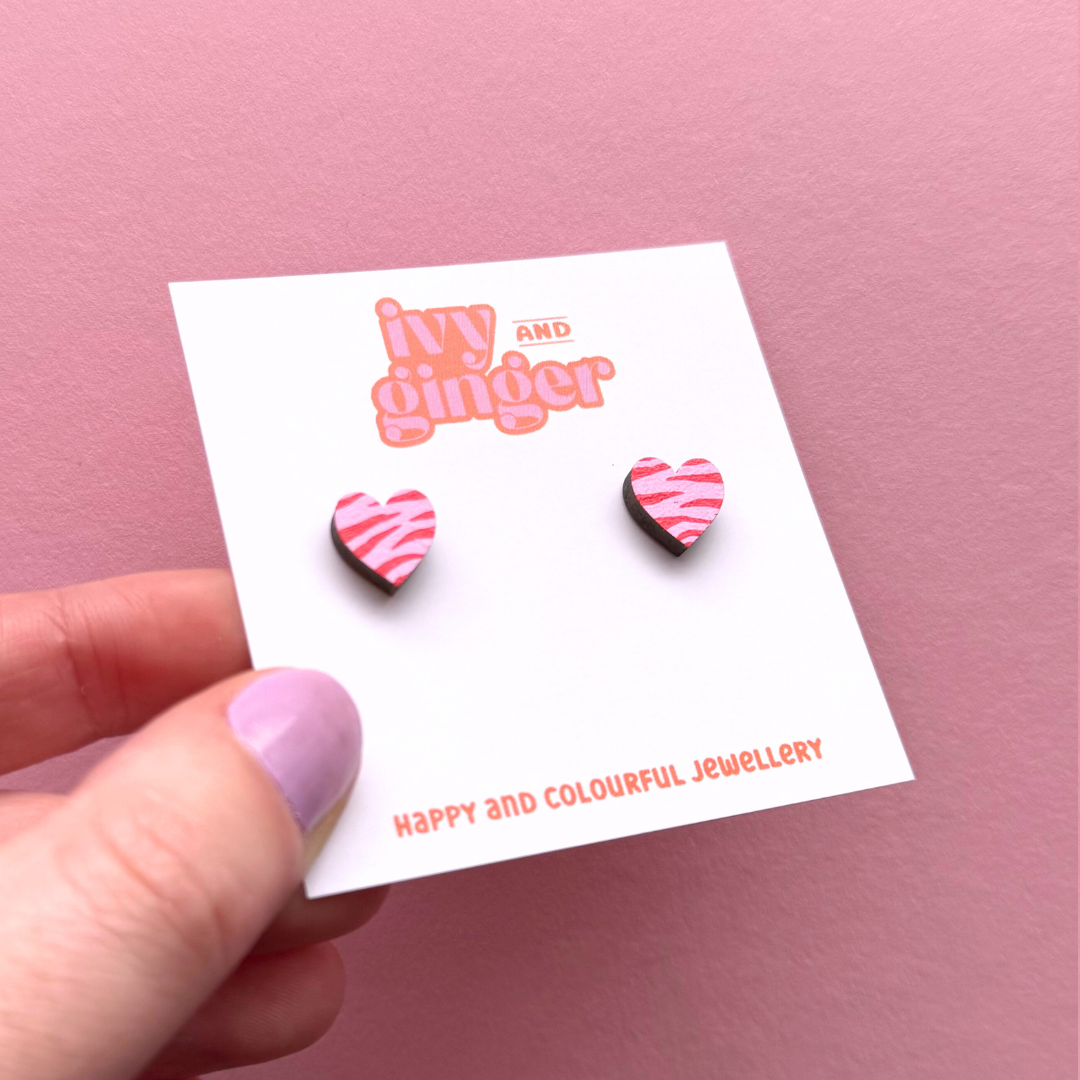 Mini pink and red zebra print heart shaped stud earrings