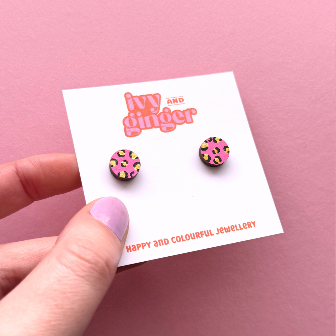 Mini leopard print circle studs in bright pink and gold
