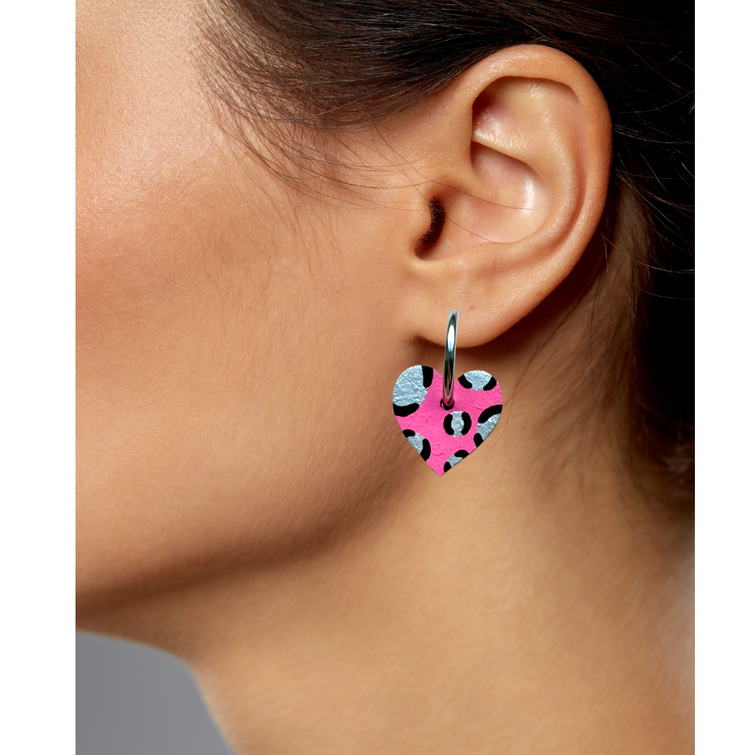 Bright pink and silver leopard print heart shaped hoop earrings