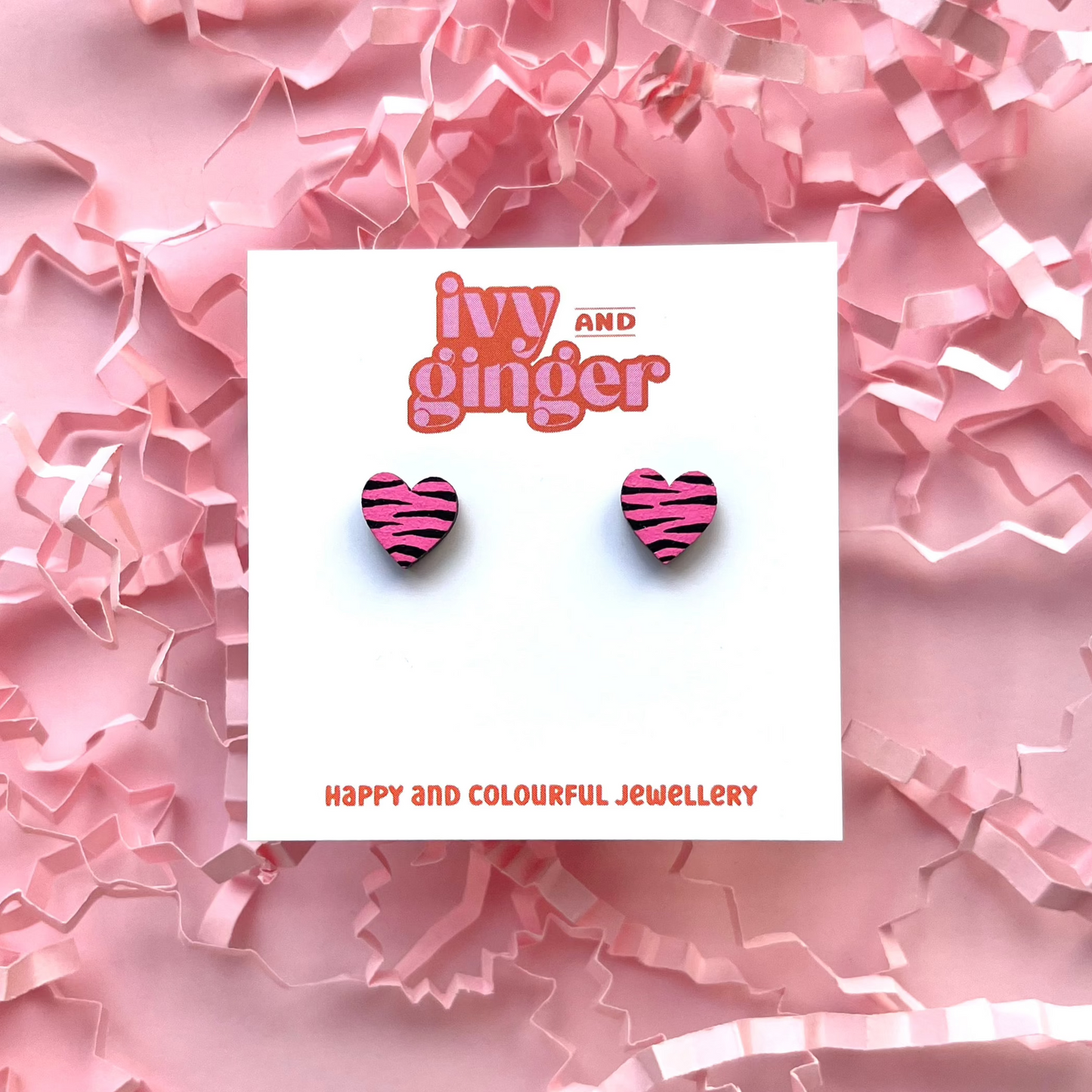 Mini bright pink and black zebra print heart stud earrings