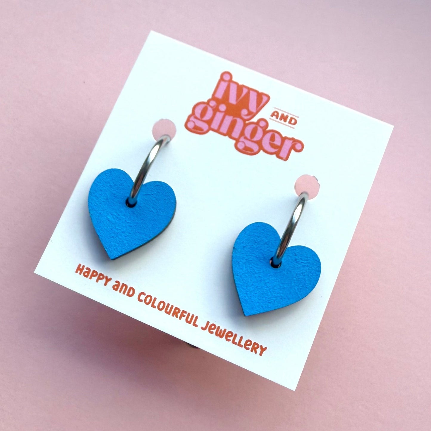 Blue heart shaped hoop earrings