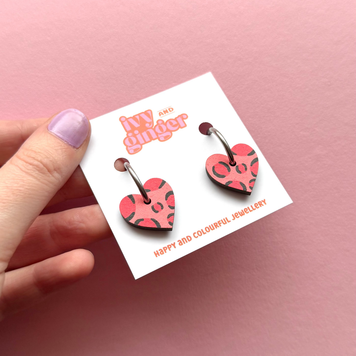 Deep pink and red leopard print small heart hoop earrings