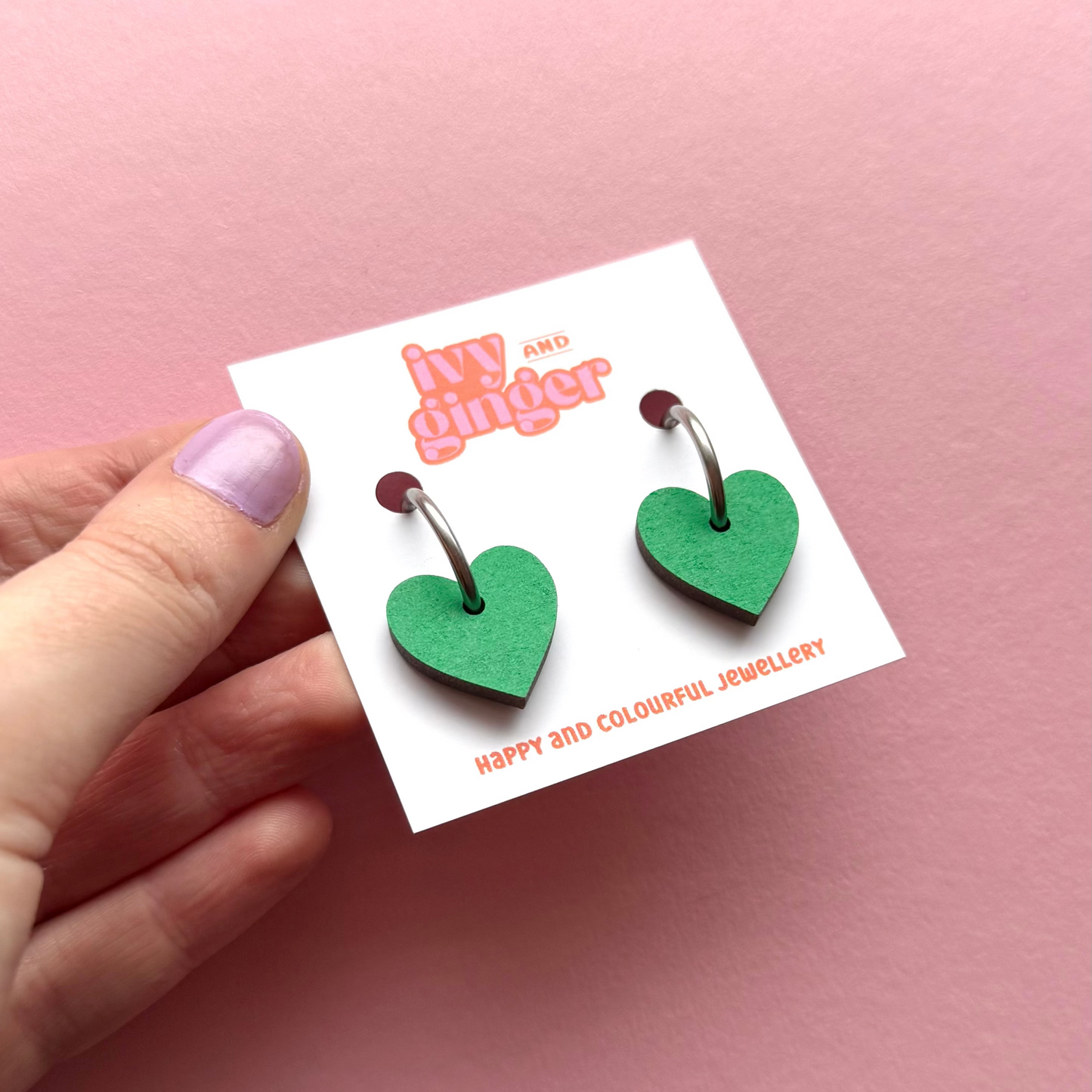 Green heart shaped hoop earrings