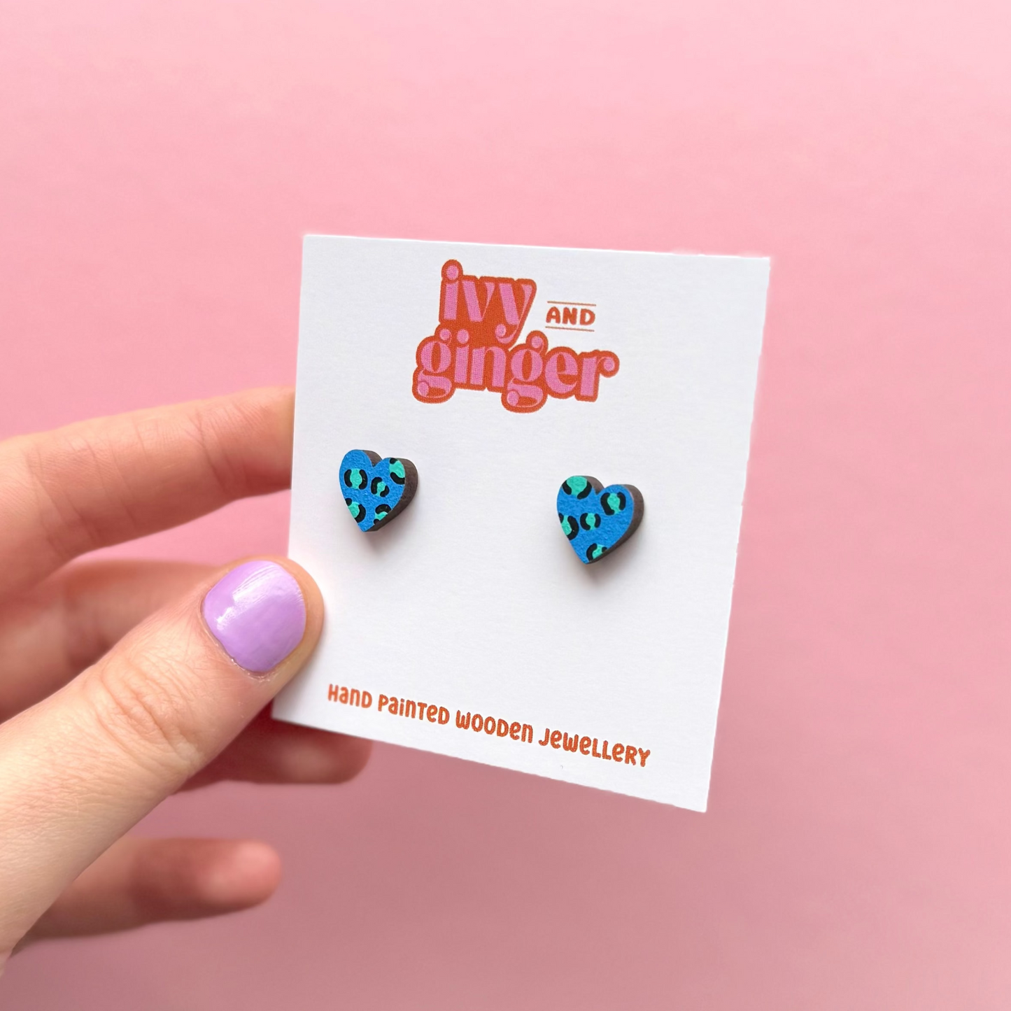 Blue and teal leopard print heart stud earrings