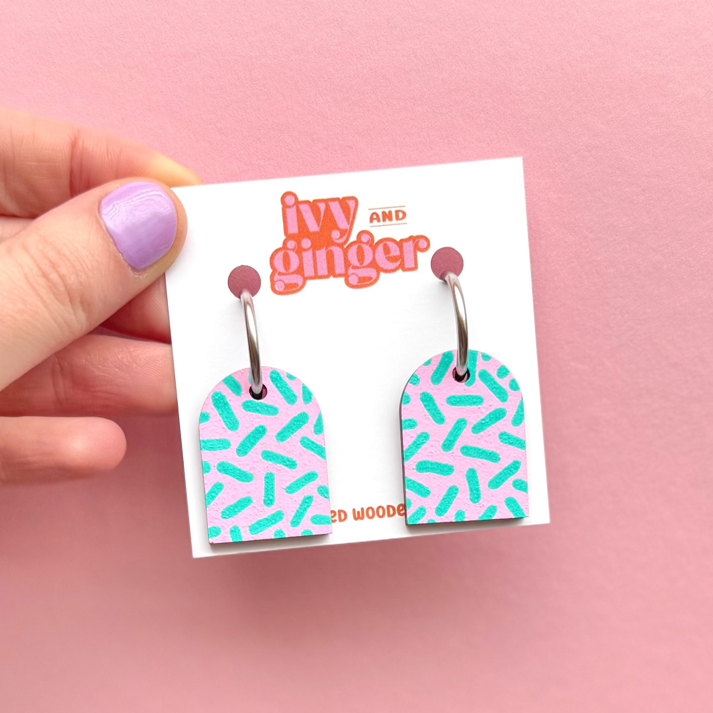 Pink and teal dash print arch dangle hoop earrings