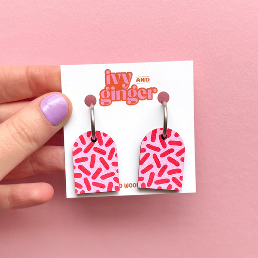 Pink and red dash print arch dangle hoop earrings