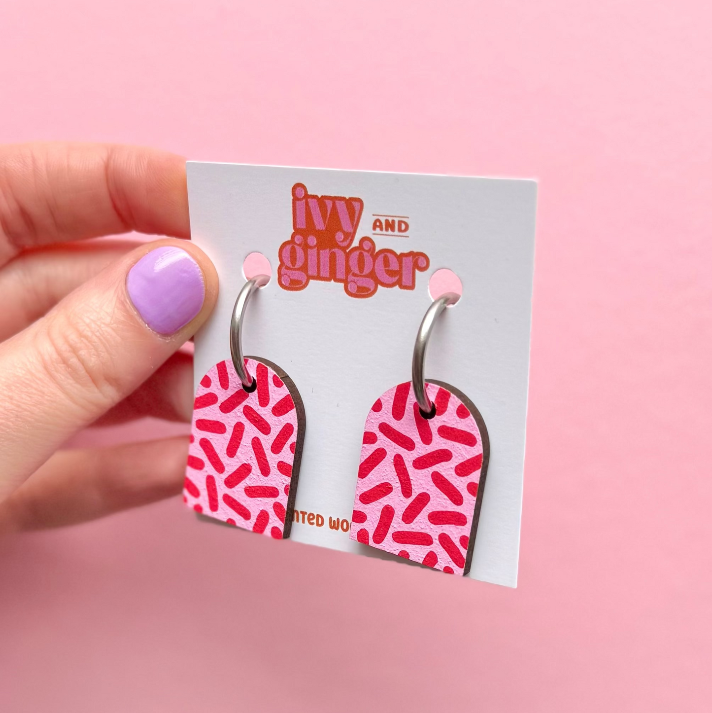 Pink and red dash print arch dangle hoop earrings