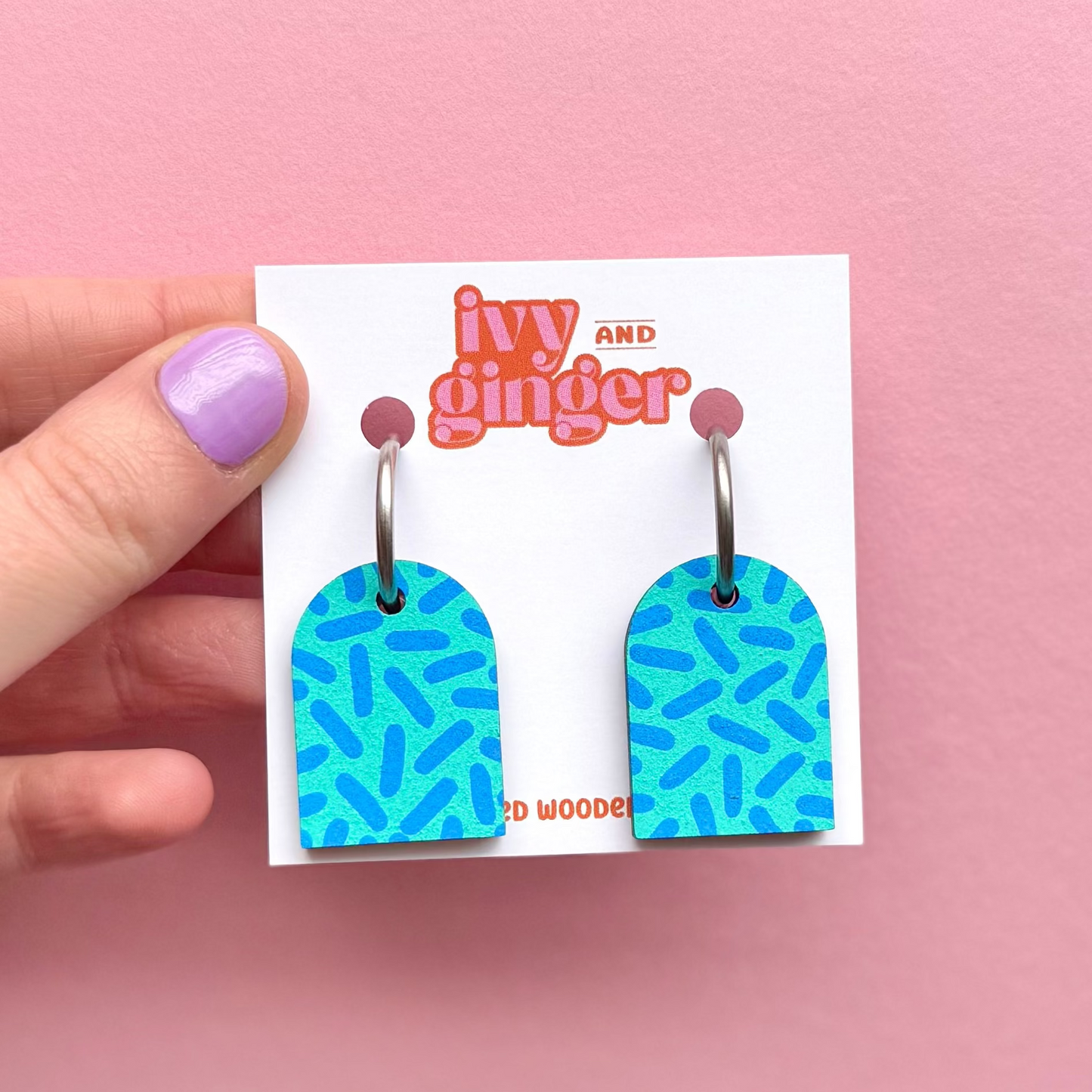 Teal and sky blue dash print arch dangle hoop earrings