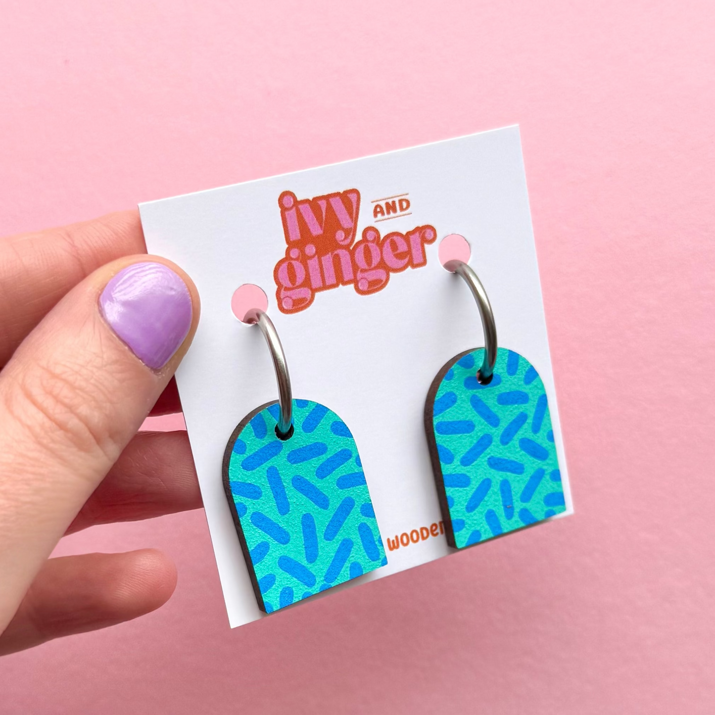 Teal and sky blue dash print arch dangle hoop earrings
