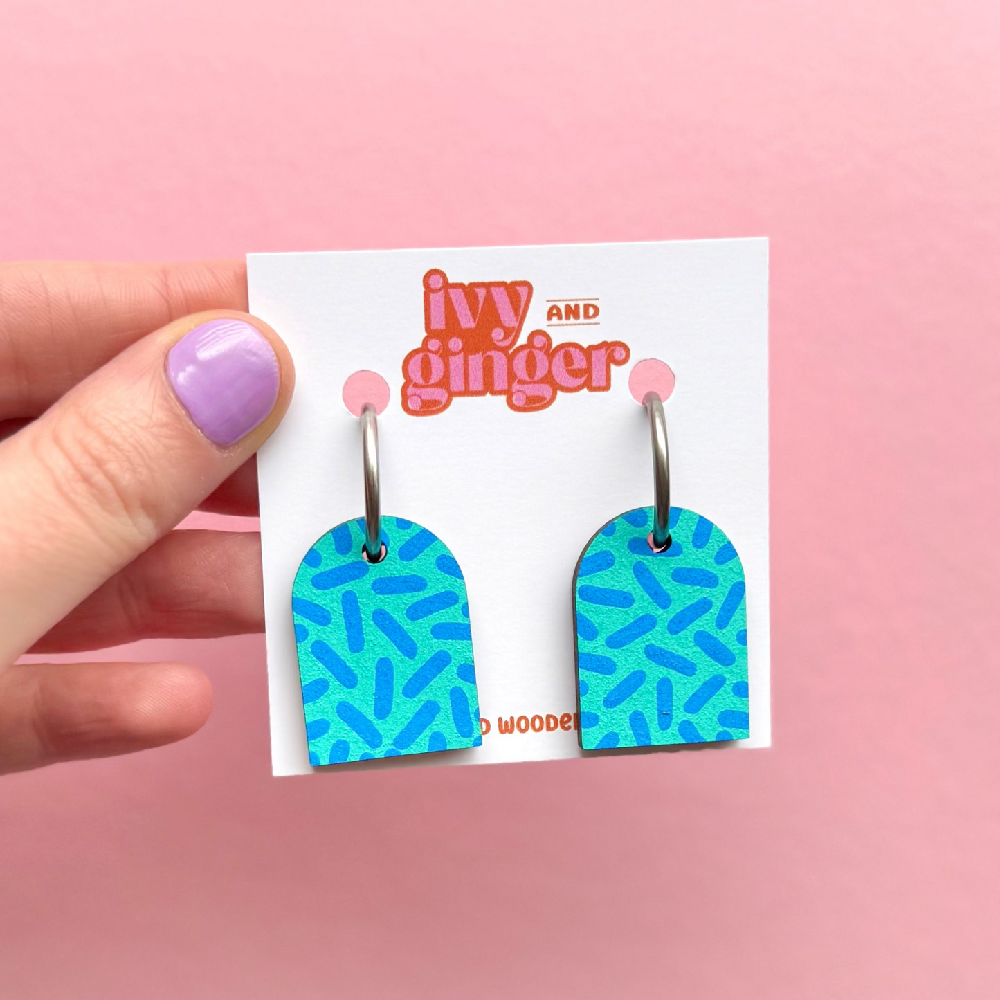 Teal and sky blue dash print arch dangle hoop earrings