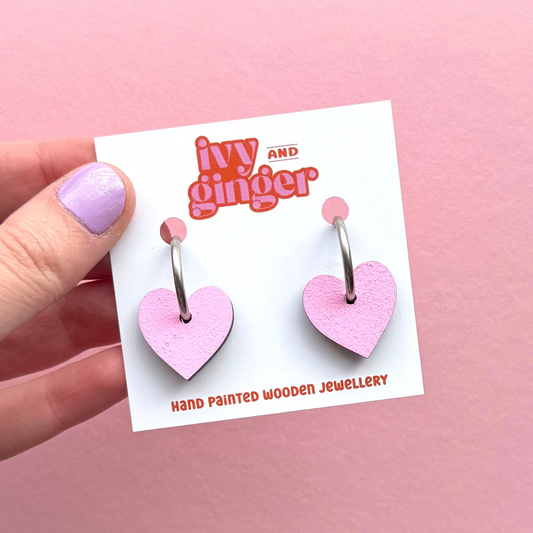 Light pink heart shaped hoop earrings