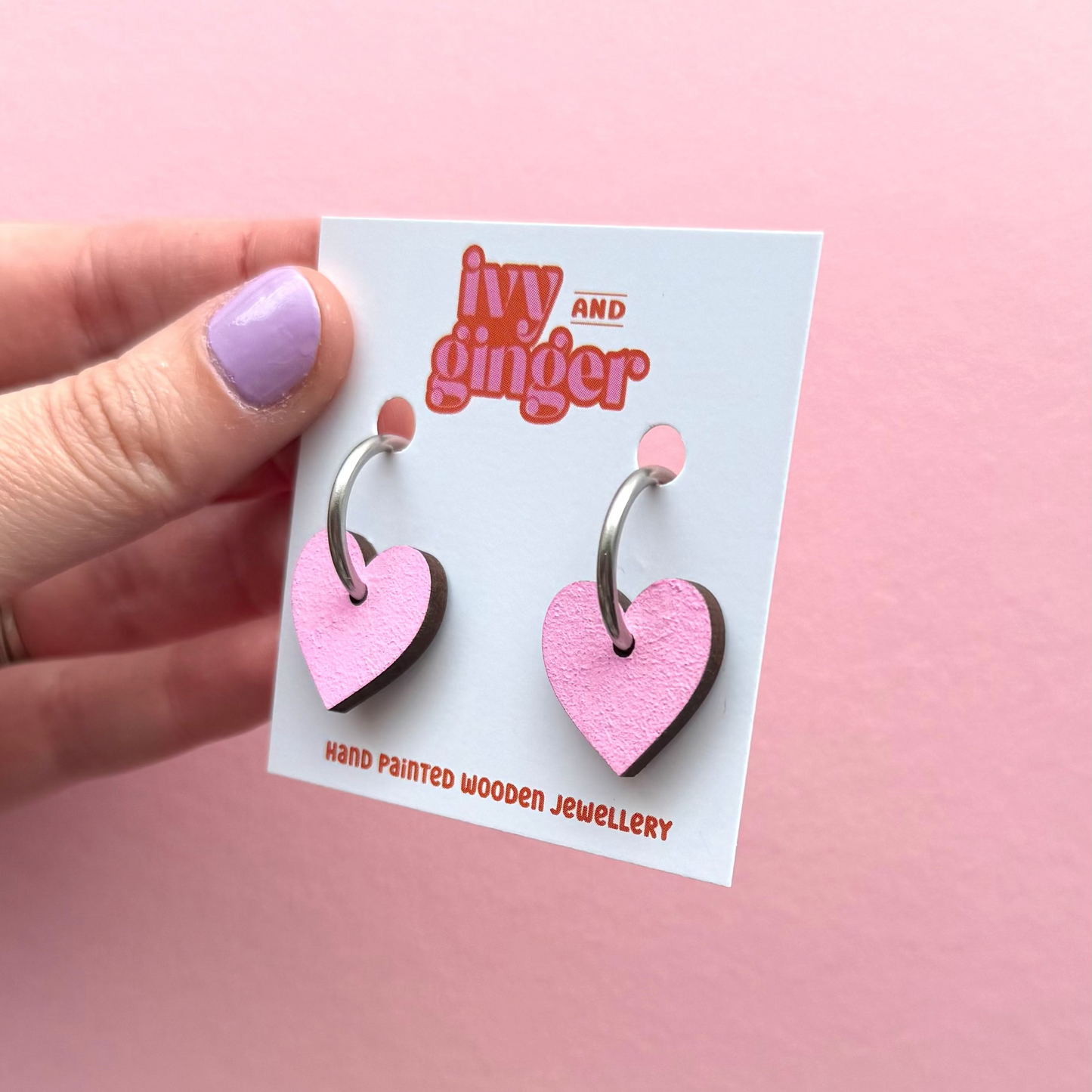 Light pink heart shaped hoop earrings