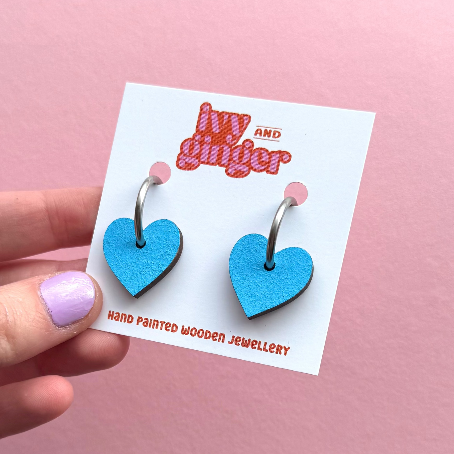 Light blue heart shaped hoop earrings