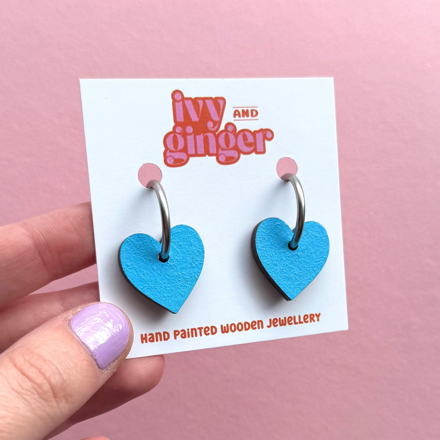 Light blue heart shaped hoop earrings