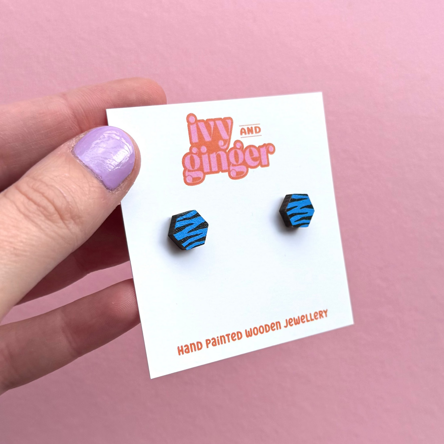 Mini blue and black zebra print hexagon stud earrings