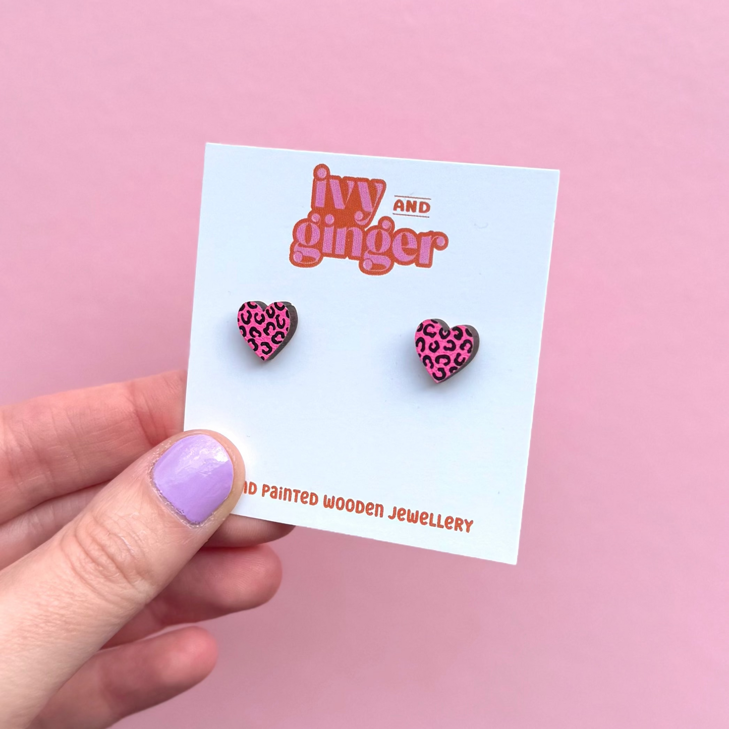Mini bright pink and black leopard print heart studs