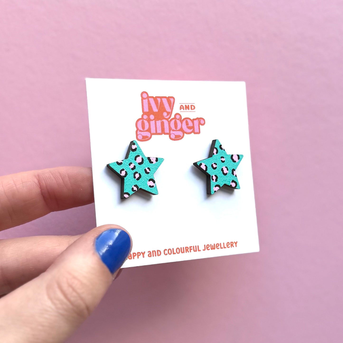 Teal and pink leopard print star stud earrings