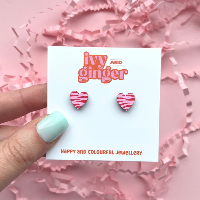 Mini pink and red zebra print heart shaped stud earrings