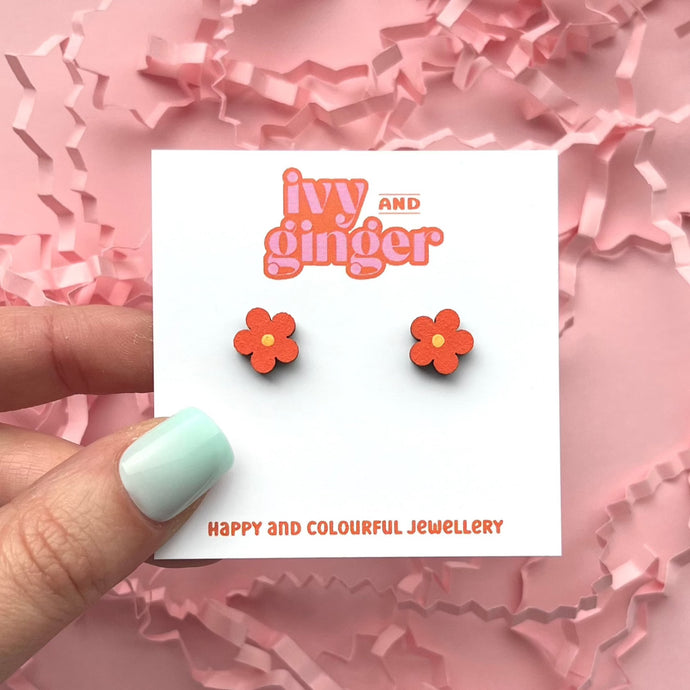 Mini orange flower stud earrings