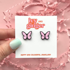 Light pink and black butterfly stud earrings