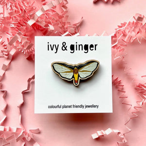 Winged insect wooden pin badge