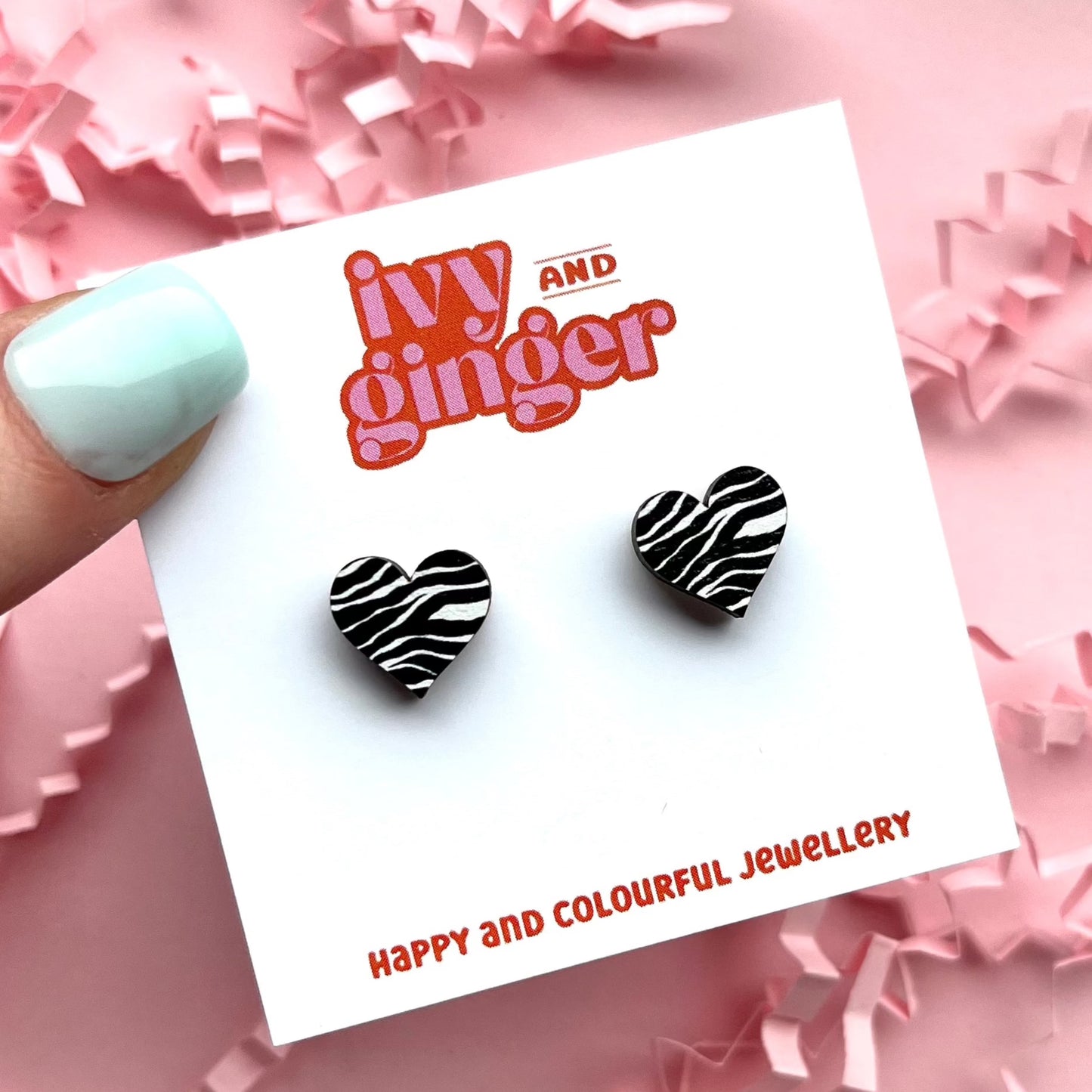 Zebra print heart stud earrings