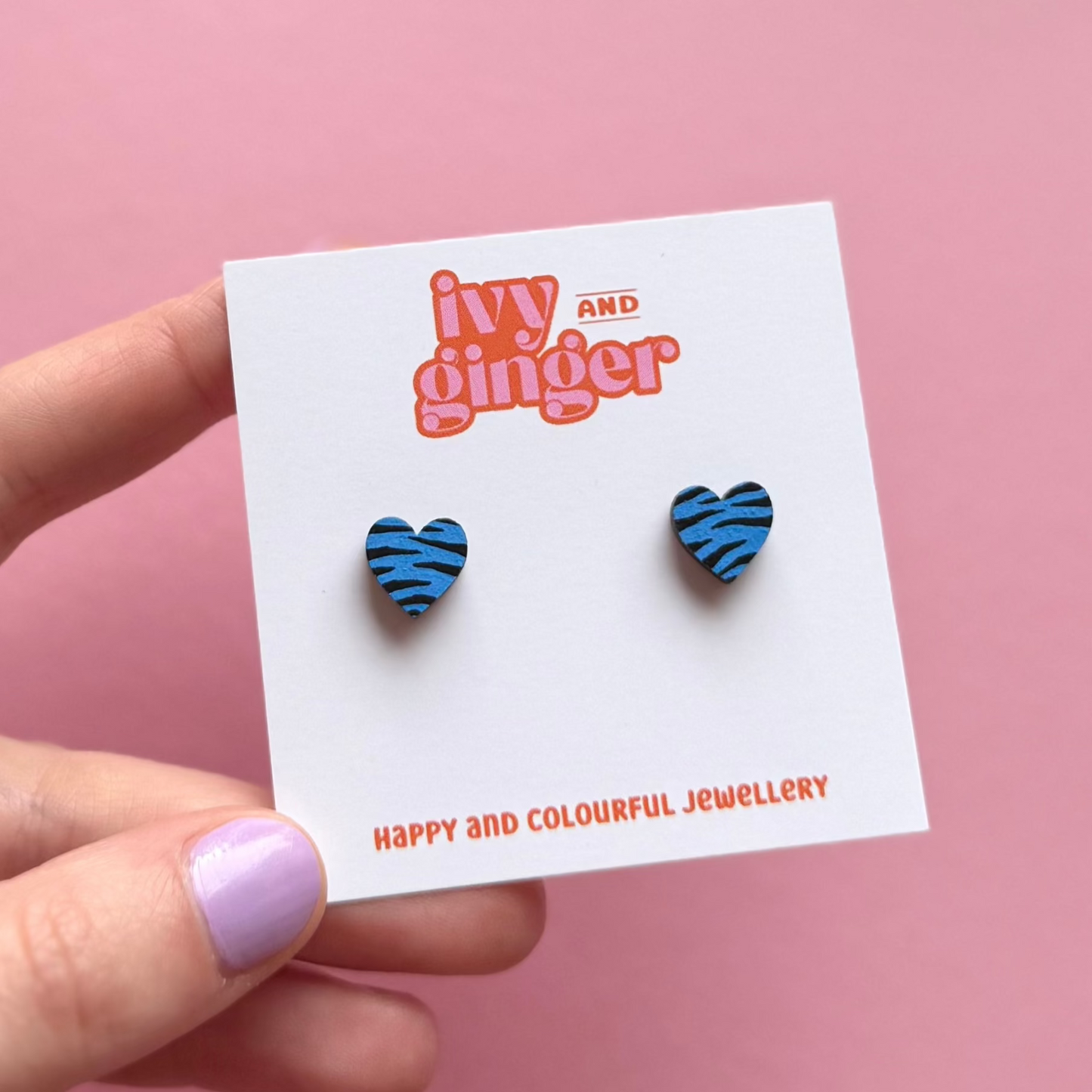 Mini blue and black zebra print heart stud earrings