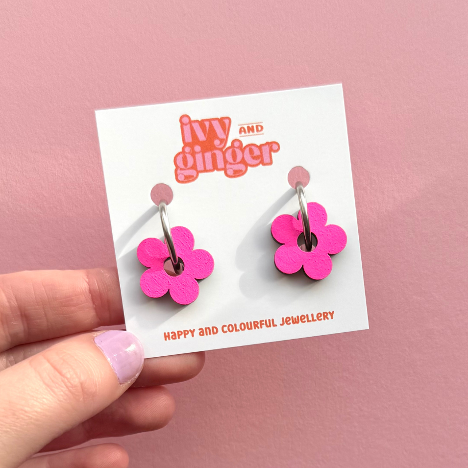 Neon pink flower hoop earrings