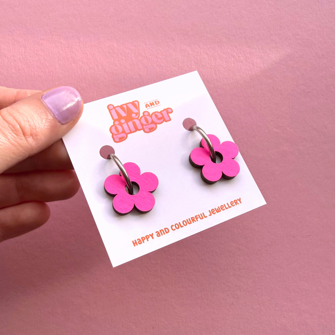 Neon pink flower hoop earrings