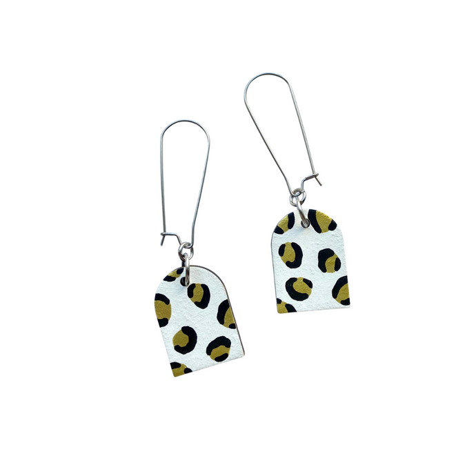 white and gold leopard print arch dangle